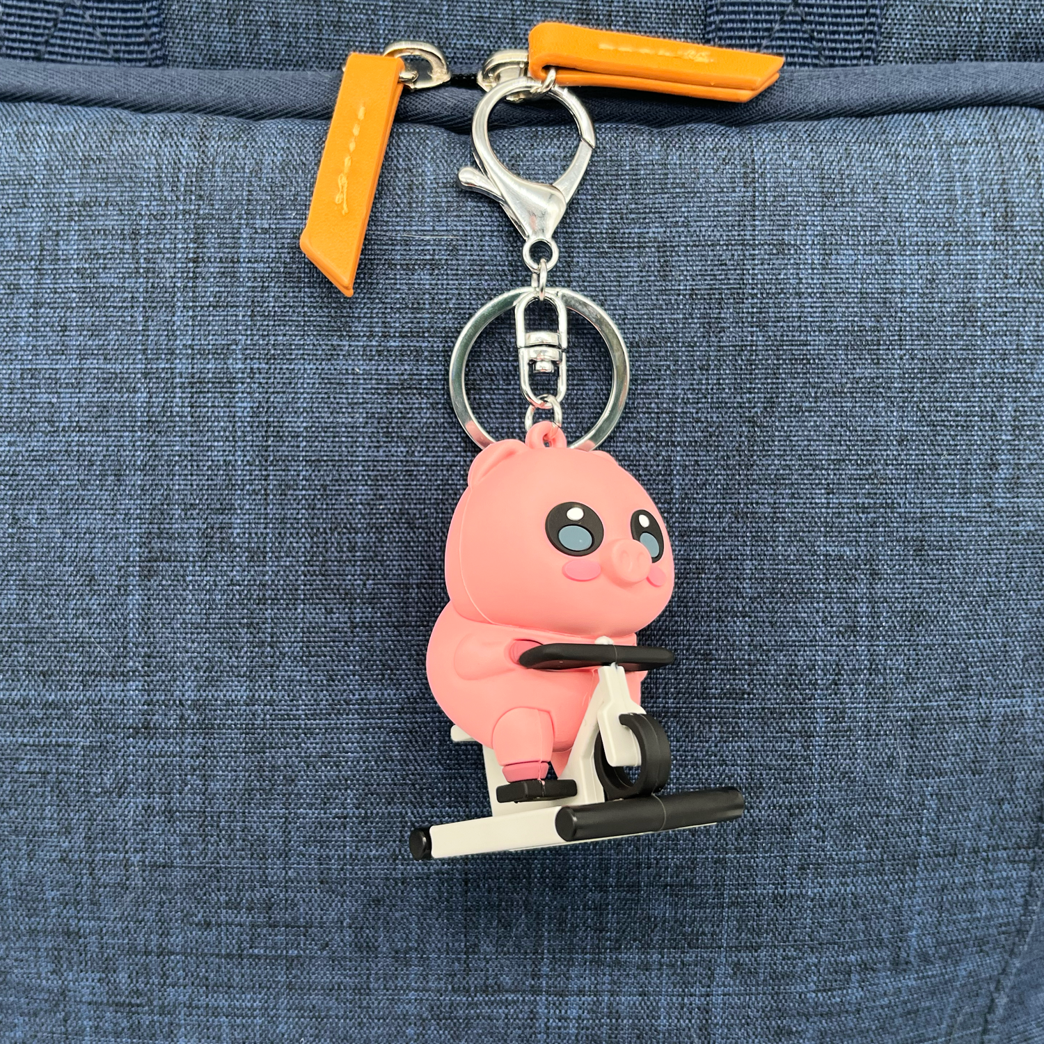 Pig on a Bike Keychain