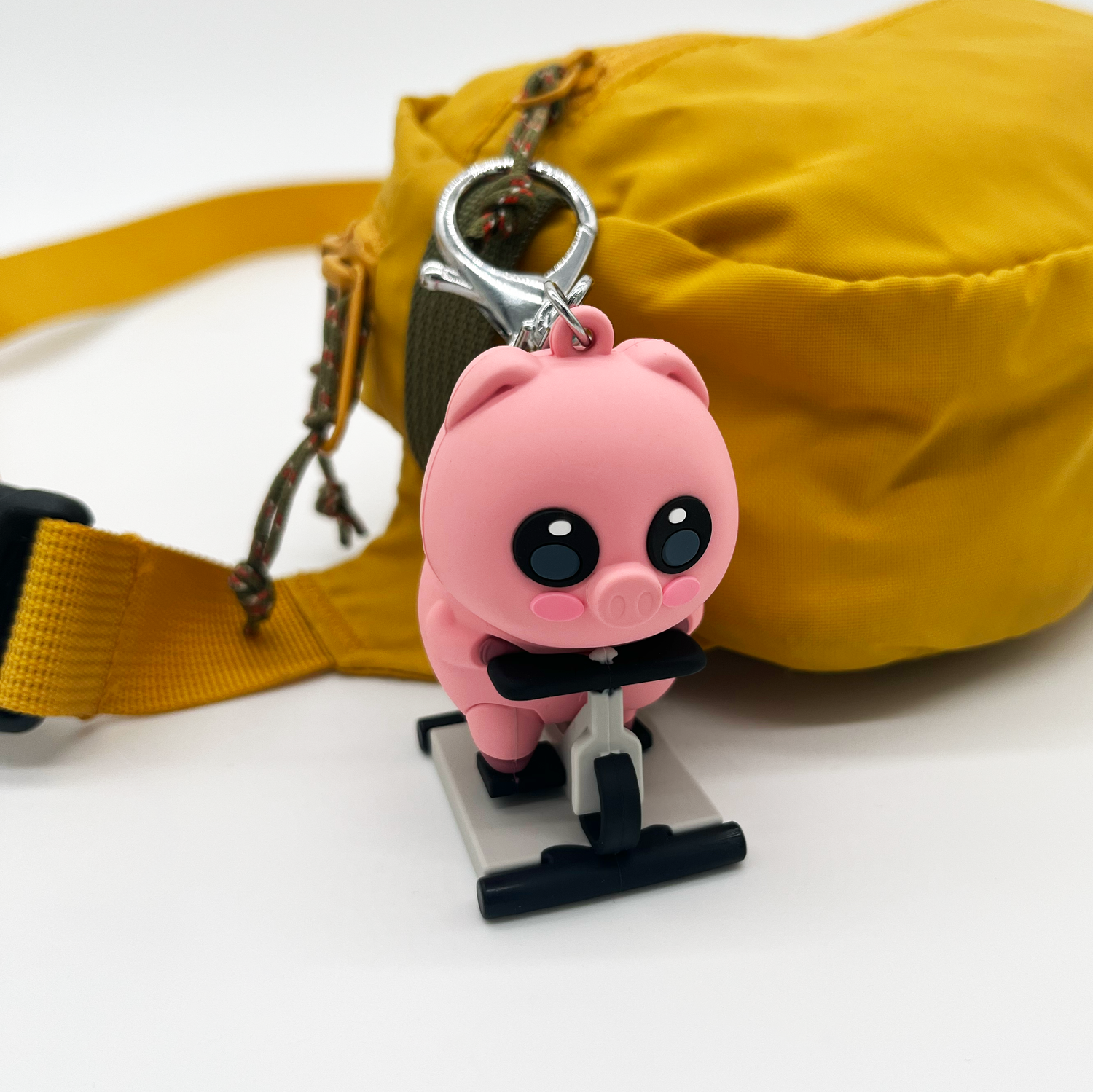 Pig on a Bike Keychain